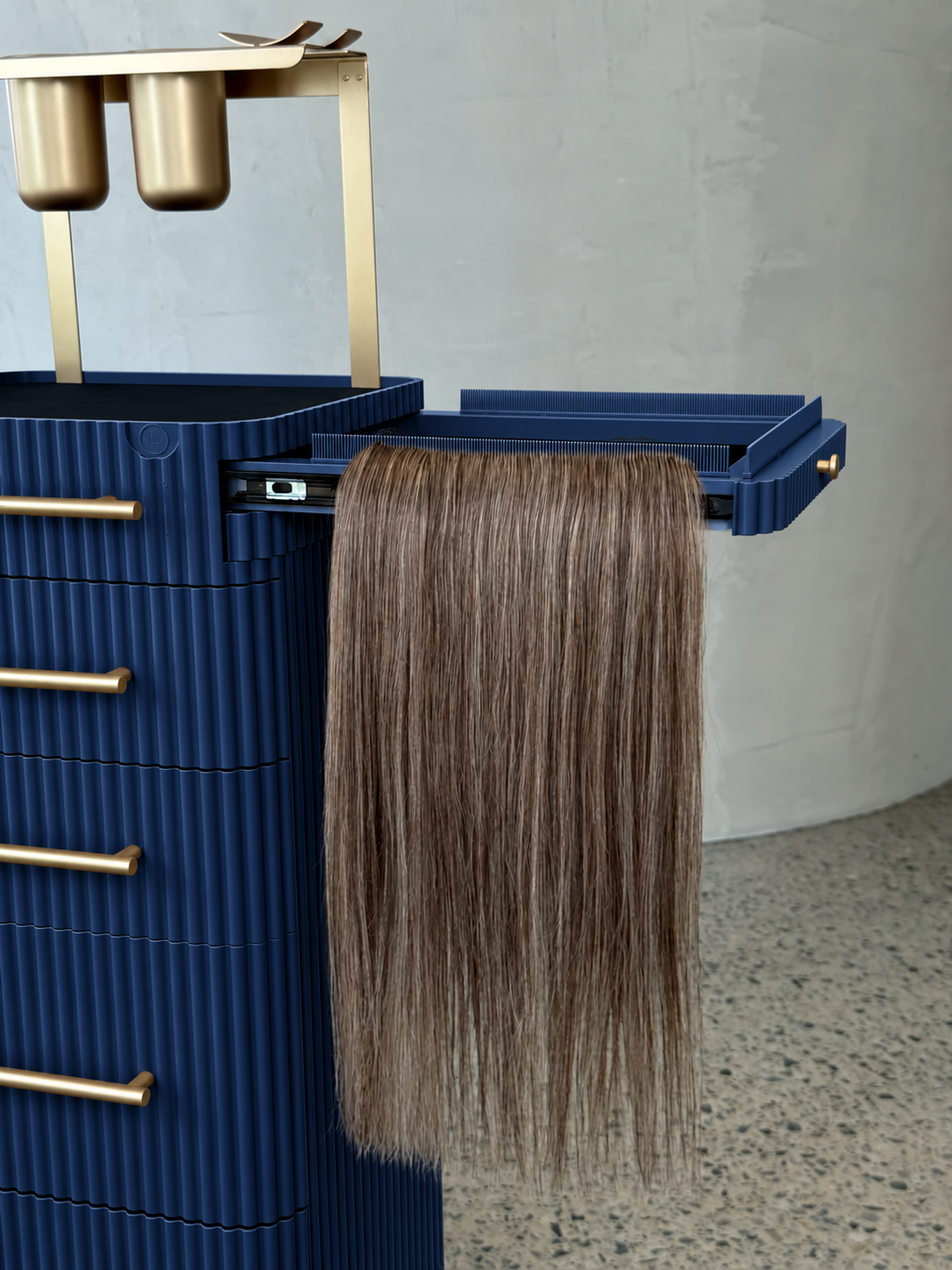 Navy & Gold trolley detail with fluted drawers, gold-coloured fittings and side holder